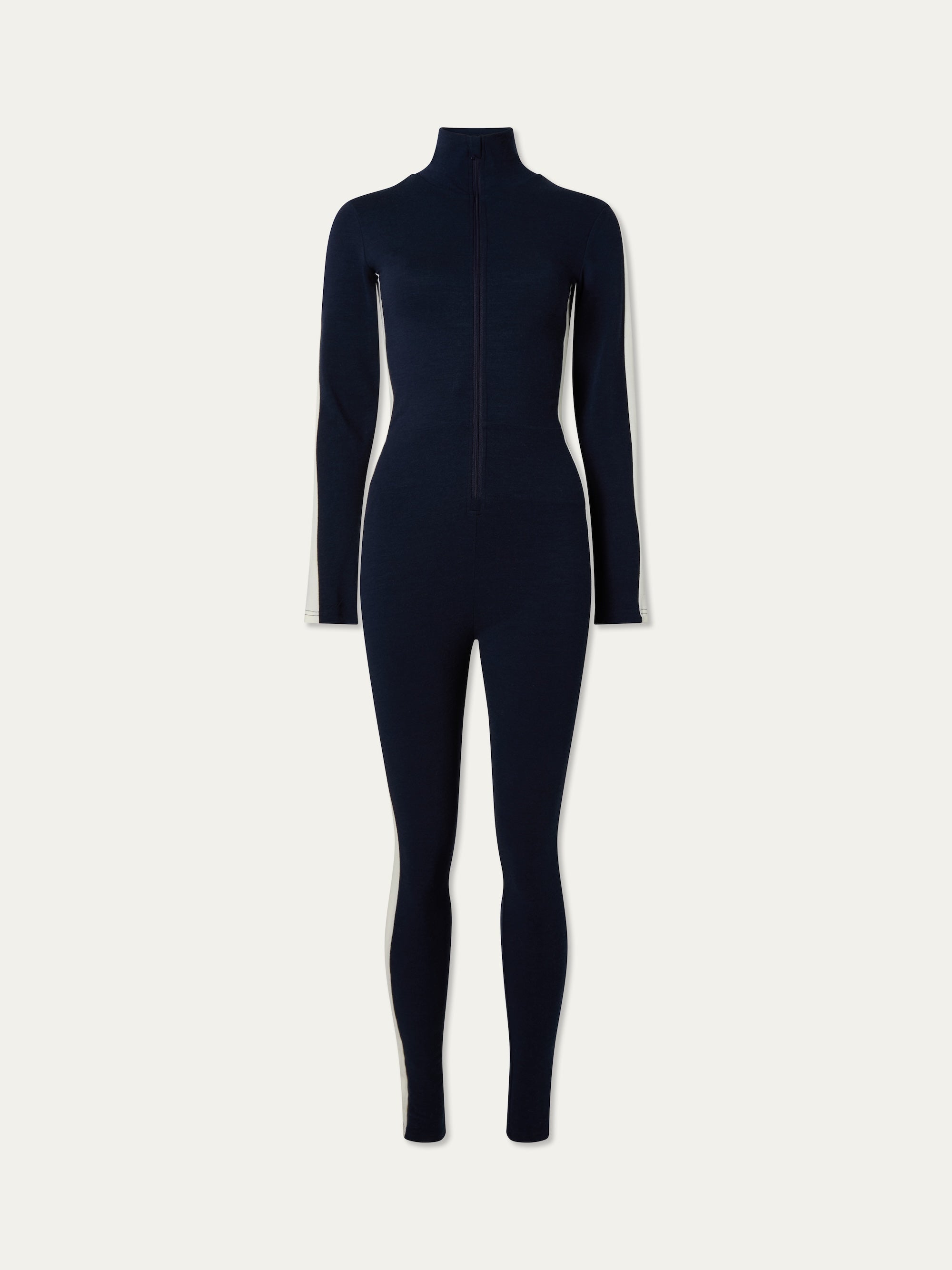 We Norwegians | FW25 | Womens Voss Jumpsuit_Navy blue | A piqué knit jumpsuit with a front zipper opening, stand collar, white panels on the sleeves with subtle branding | Shot against an off-white background