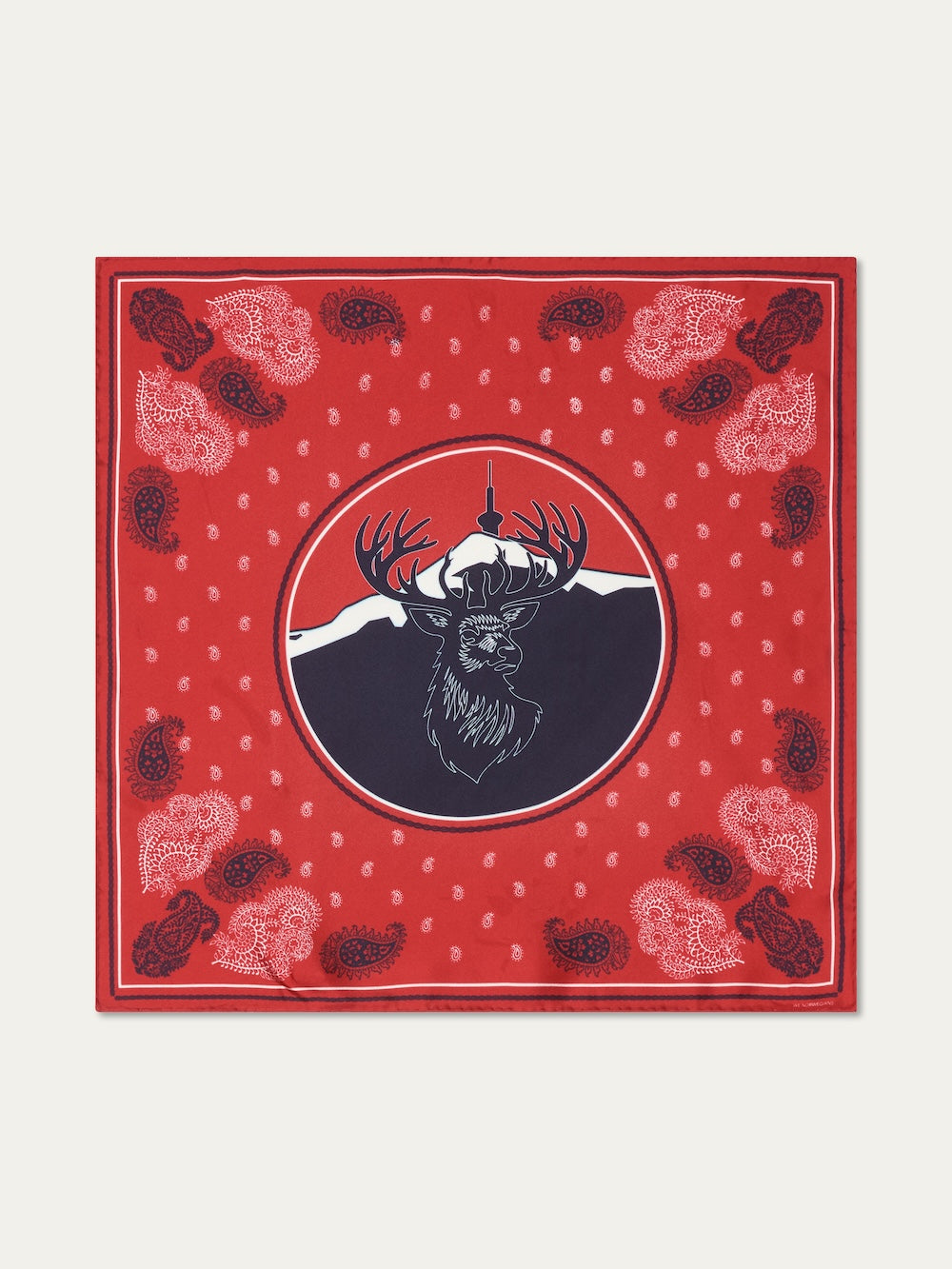 We Norwegians | FW25 | Western silk scarf_Red | Printed with paisley patterns and a center stag motif | Shot against an off-white background