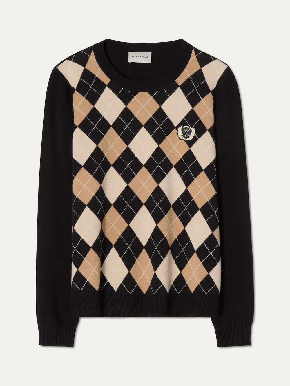 Black sweater with beige argyle pattern on an off white background