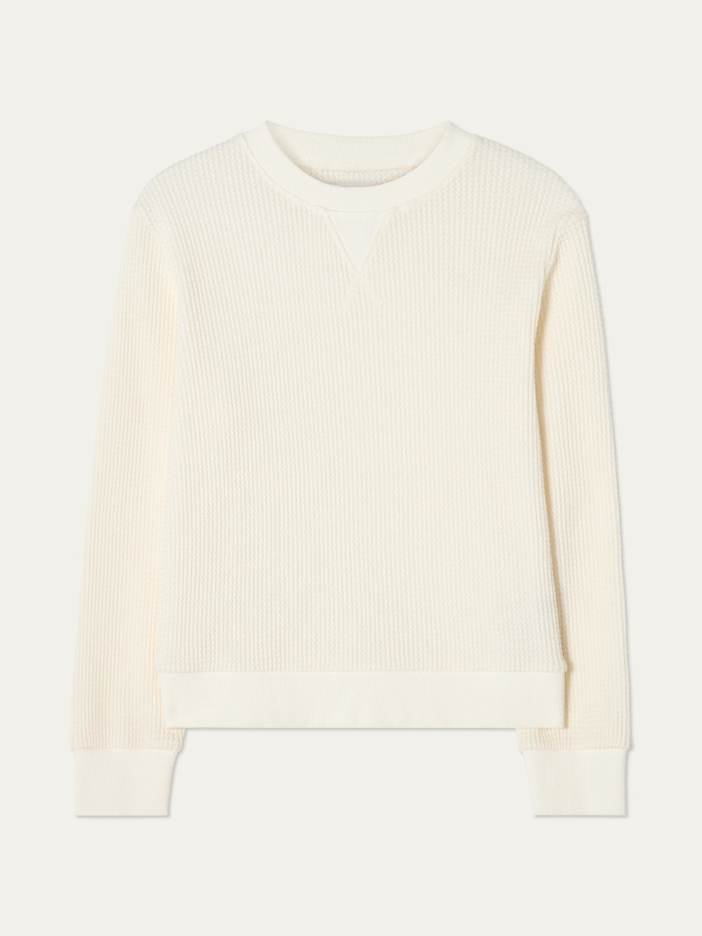 Off white-colored waffle knit crewneck on a light background