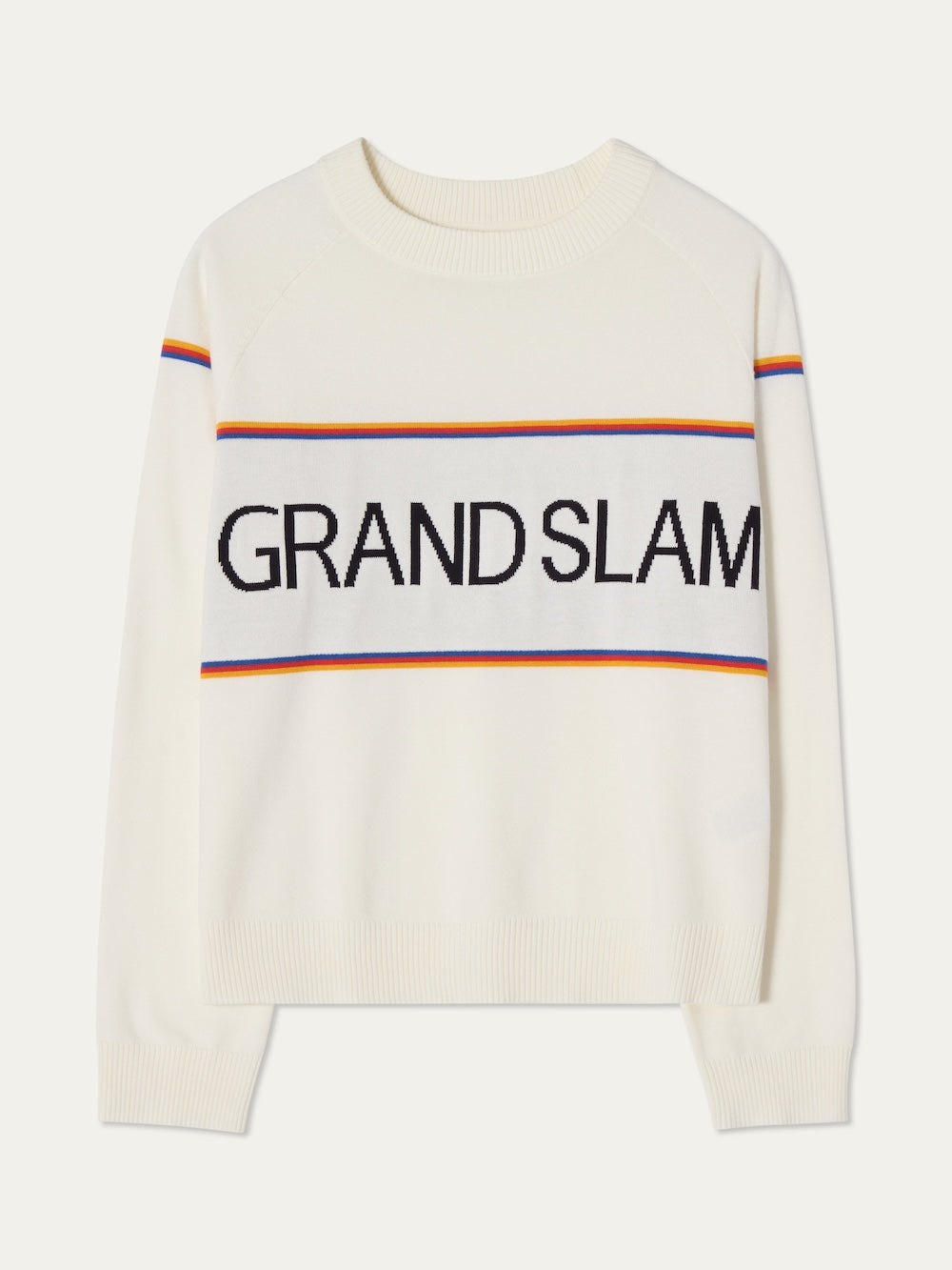White sweater with 'GRAND SLAM' text and colorful stripes on an off white background