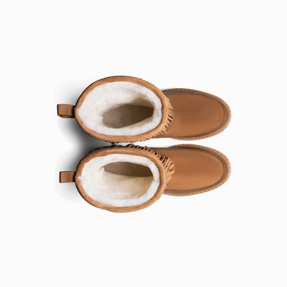 Mono x We Norwegians | FW25 | Cognac boots with fringes, with shearling wool lining, on a white background