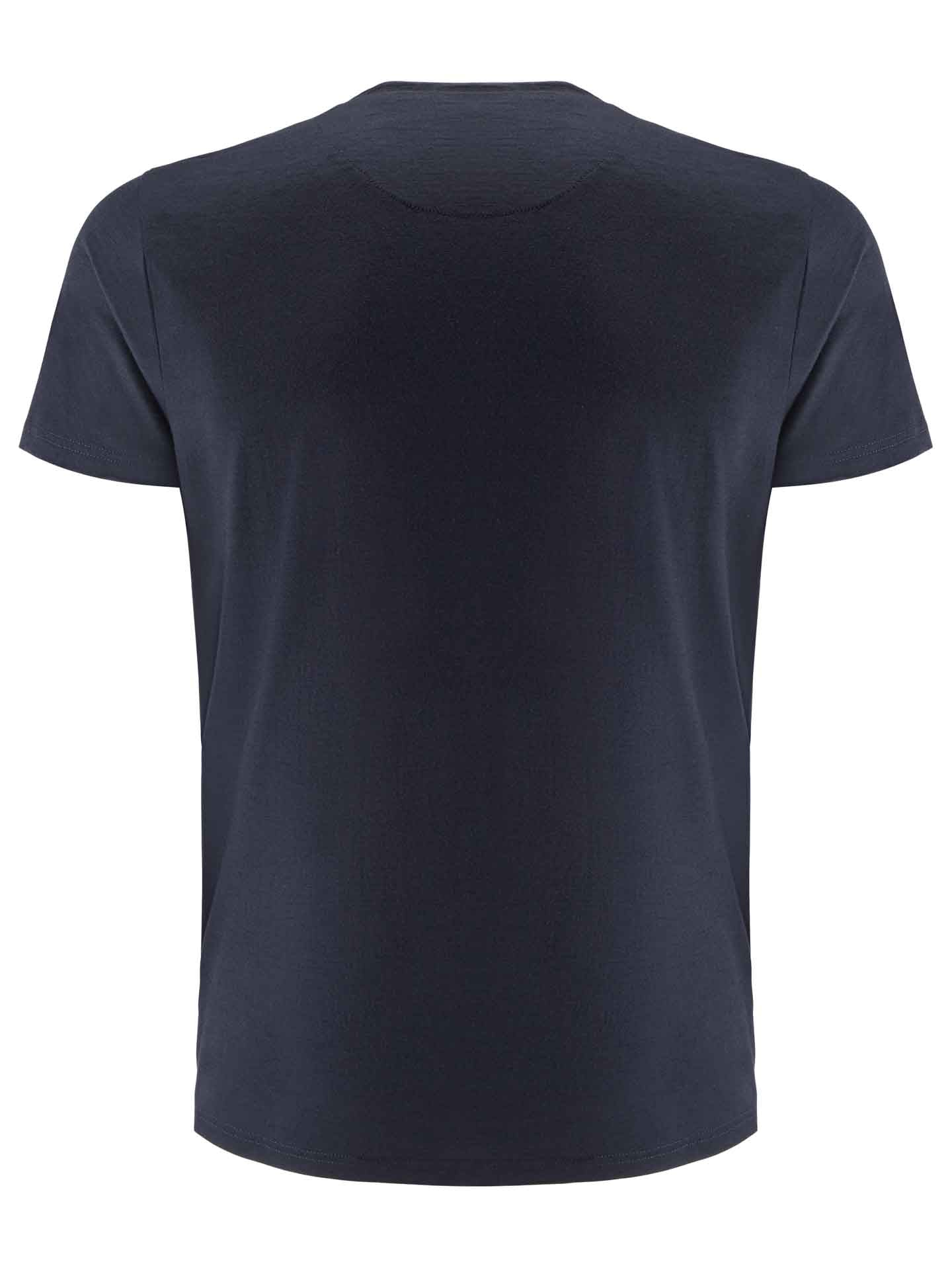 A plain dark navy blue short-sleeve "Sno Merino Tee Men" from We Norwegians is displayed, crafted from plush Creora-Eco-Soft fabric. The T-shirt has a crew neckline and appears incredibly smooth. The image shows the back view, highlighting the simplicity and solid color of this Scandinavian luxury base-layer.