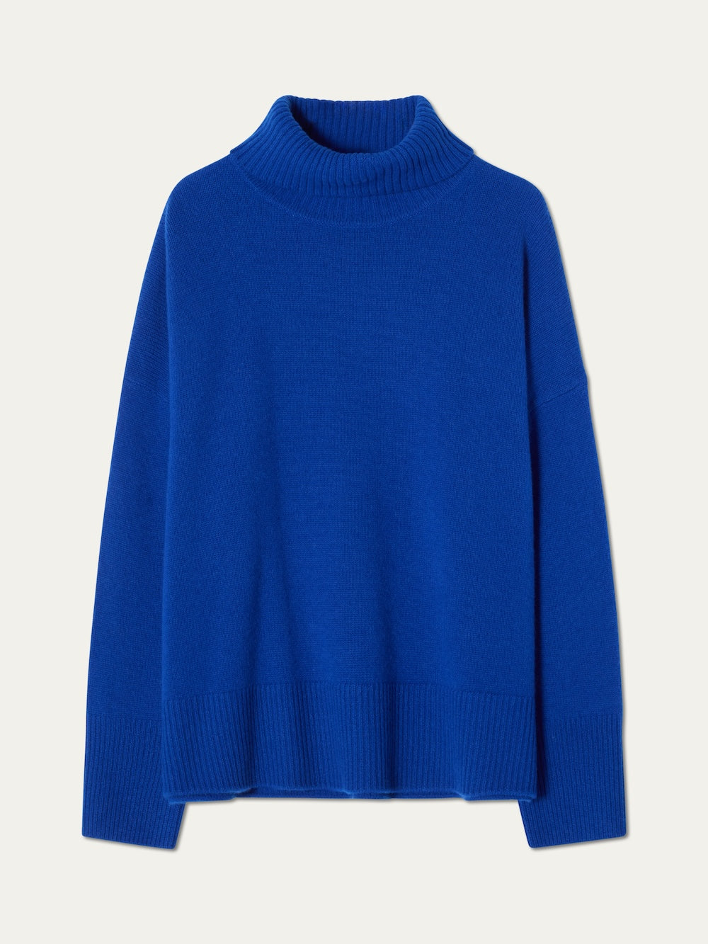 The We Norwegians Blefjell Sweater Women—pure cashmere in bright blue—features long sleeves, ribbed cuffs, hem, and neck, shown flat on a plain light background.