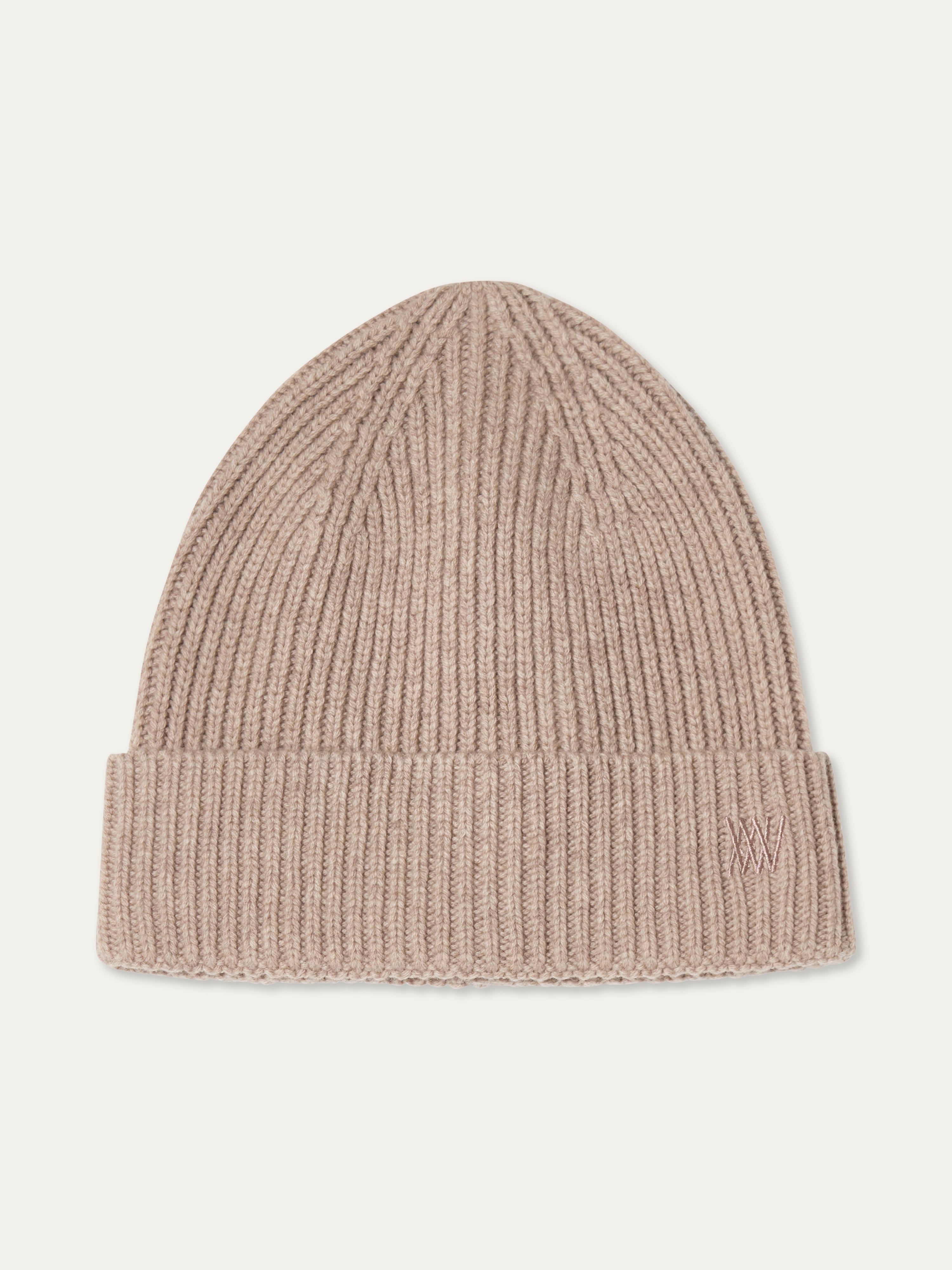 We Norwegians | FW25 | Dal Hat | A knit beanie in sand on an off-white background