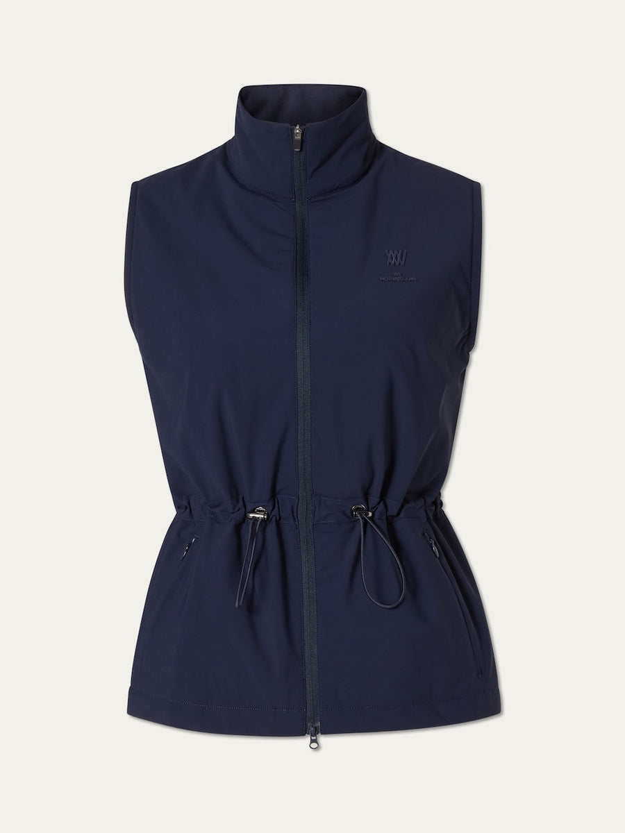 Navy blue vest with a brand logo on an off white background