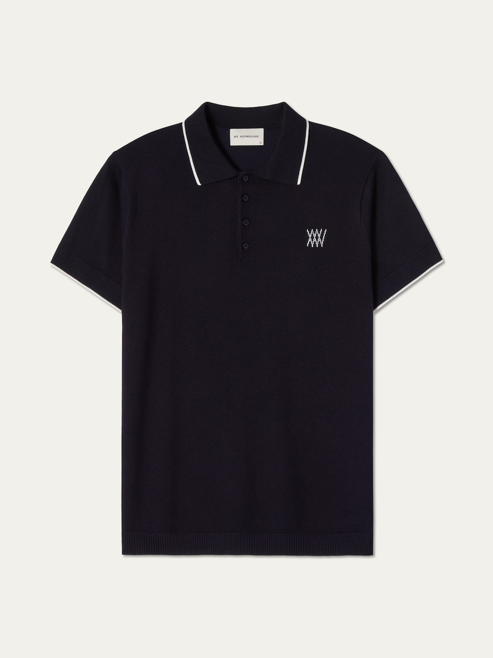 Navy blue polo shirt with white trim on a light background