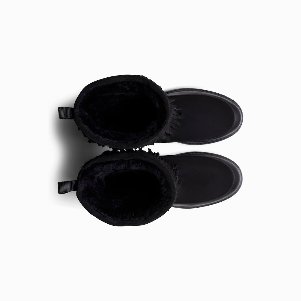 Mono x We Norwegians | FW25 | Black boots with fringes, with shearling wool lining, on a white background
