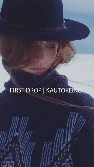 We Norwegians_FW25_Women | Model is wearing the Kautokeino sweater in navy blue | Set in snowy Geilo, Norway